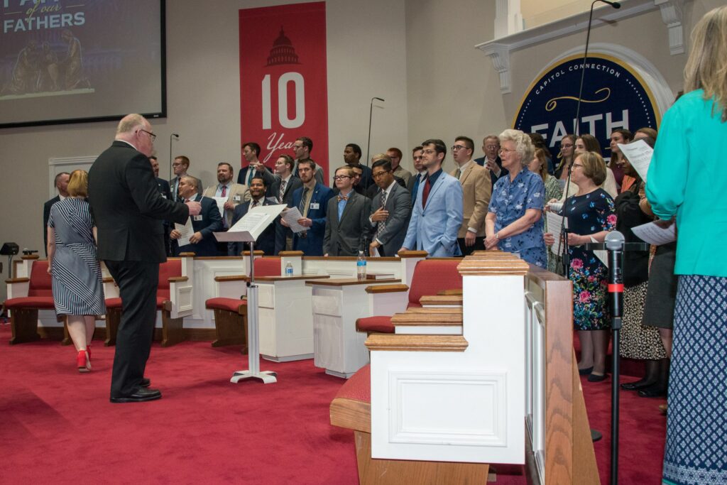 Evangelist Byron Foxx leads Choir Practice at Capitol Connection